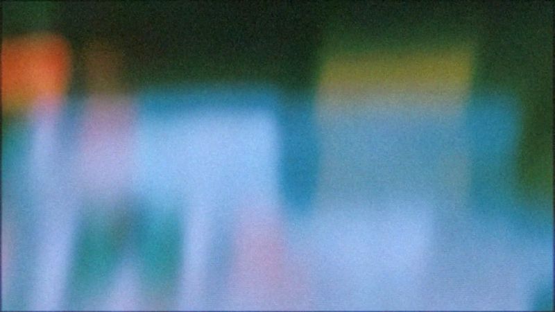 Photo of red, blue, and yellow shapes in motion